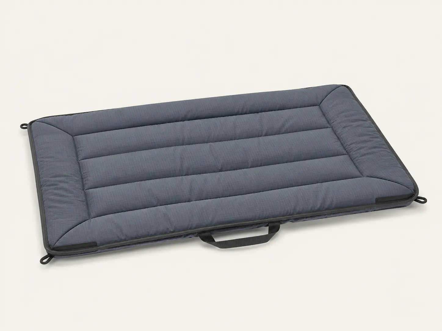 Kurgo Loft Wander Dog Bed rolled out as a portable settle mat