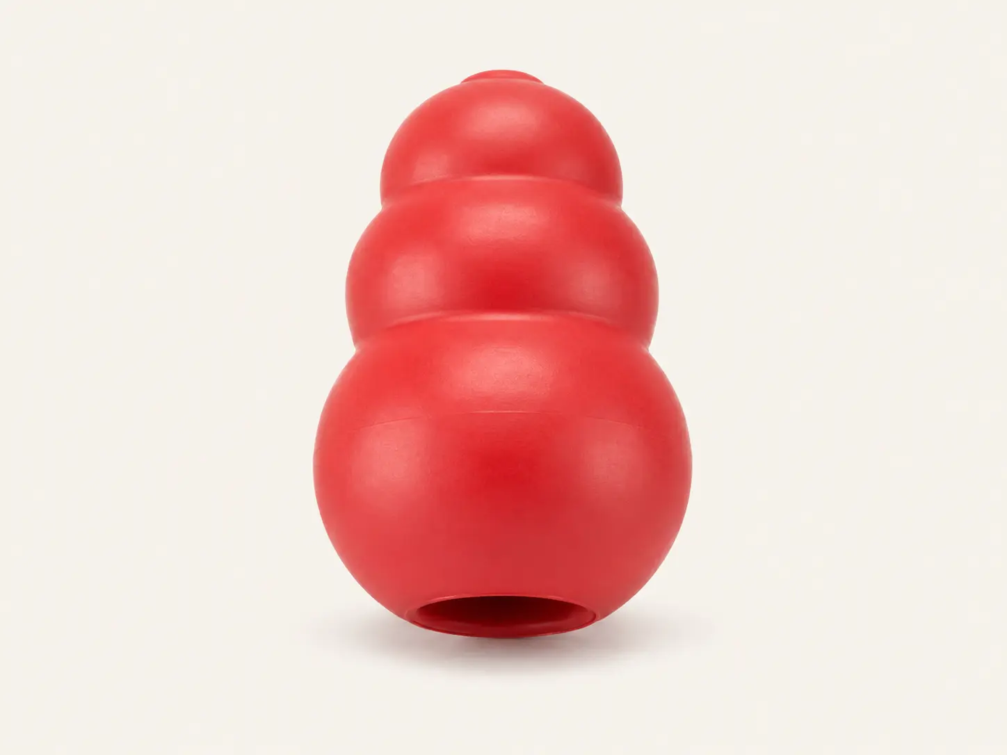 Red KONG Classic natural rubber dog toy prepared for food stuffing