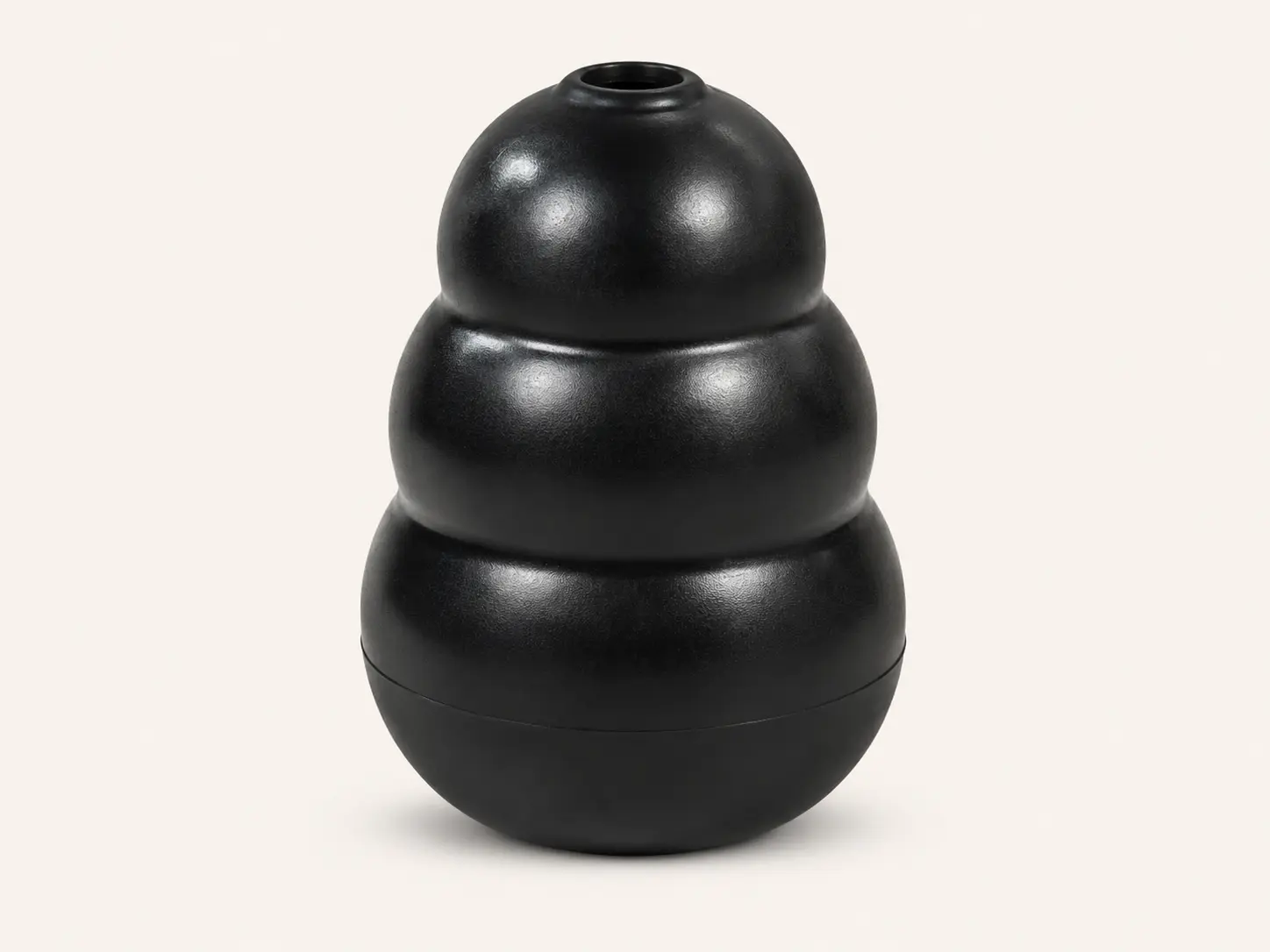 Black KONG Extreme natural rubber dog toy shown upright